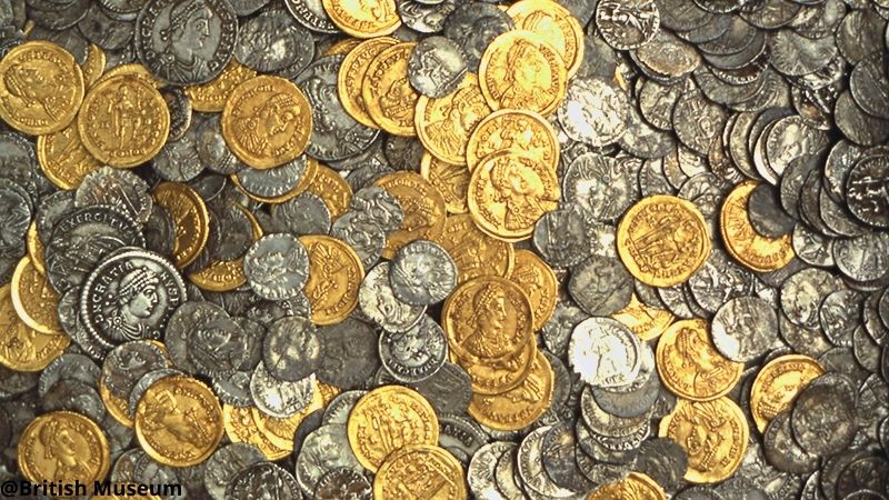 a pile of roman empire coins